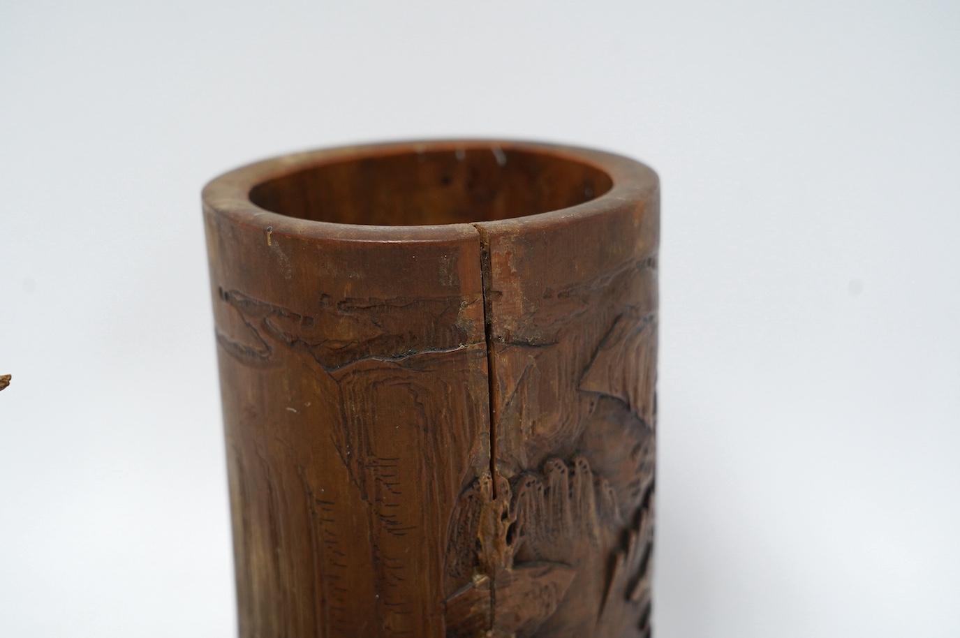 A 19th century Chinese bamboo brushpot and a rootwood and rosewood scholar's stand, root wood stand 30cm wide. Condition - some damage and repairs